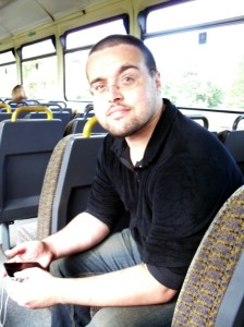 Photo of Scott sitting on the Reddish South to Denton train