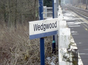 Photo of Wedgwood station sign, at an odd angle