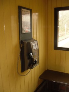 Photo of payphone inside the shelter at Coombe Junction Halt station