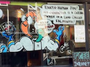 Photo of Earthworm Jim artwork outside an internet café